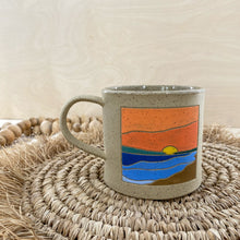 Load image into Gallery viewer, Round Lake, Sk Mug with Orange Sunset and Dark Sand
